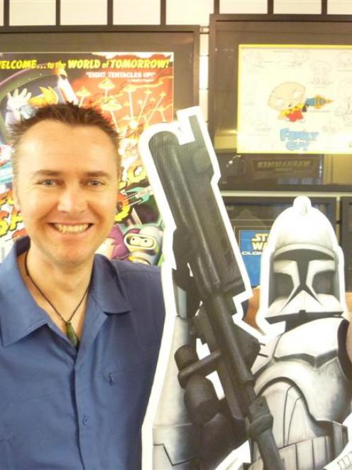 The stolen clone trooper with Reel Collectibles owner Hugh Clark. Photo supplied.