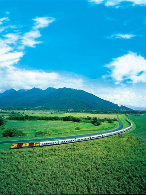 The Sunlander makes its way through the Queensland countryside. Photo by Travel Train.