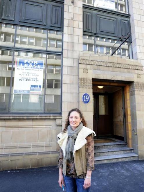 Woods Adams building owner Michelle Kennard, in front of the Bond St building she has restored...