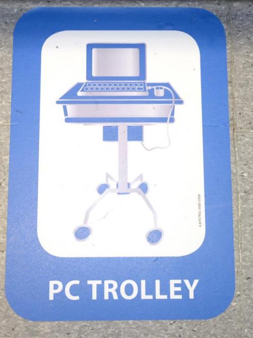 A floor mat for computer trolley.