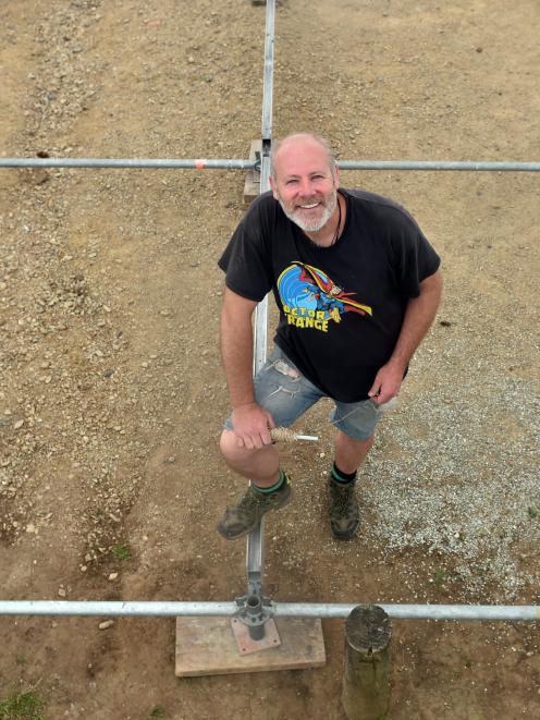 Whare Flat Folk Festival site manager Andrew Bowen says preparations for the four-day festival...