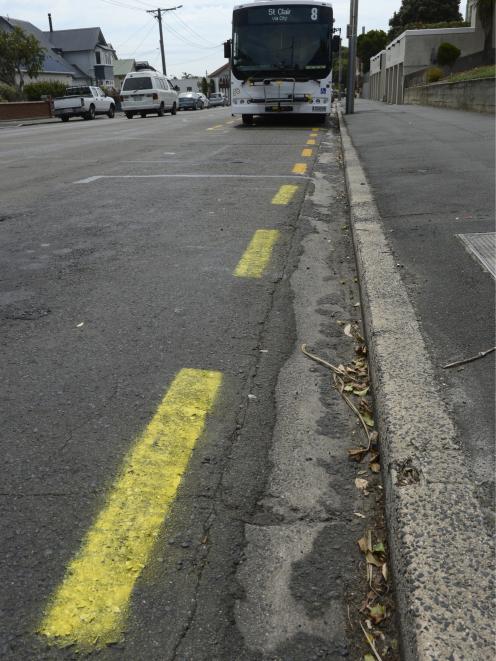 Hand-painted yellow lines have appeared in front of a bus stop in Bedford St in St Clair. There...