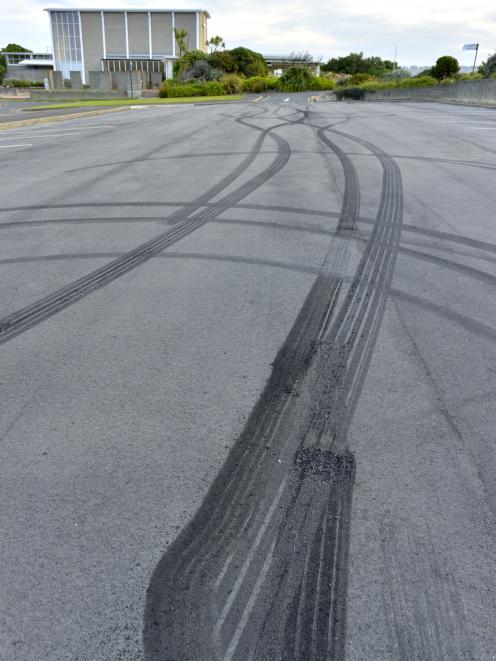 Tyre marks left from burnouts at Andersons Bay Cemetery. 

