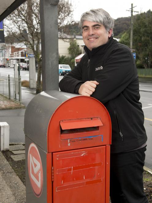Dunedin Mayor Aaron Hawkins is pleased a damaged post box at South Rd in Caversham has now been...