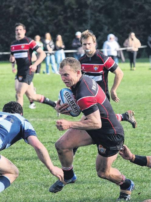 North Canterbury halfback, Jordy Gray leaves Ellesmere defenders sprawled in his wake after one...