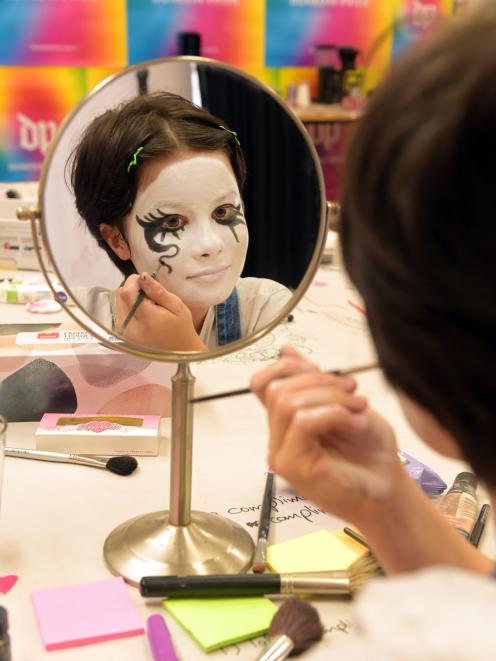 Dina Tukhvatulina (12), of Dunedin, experiments with make-up at the Dunedin Pride’s first Make-Up...