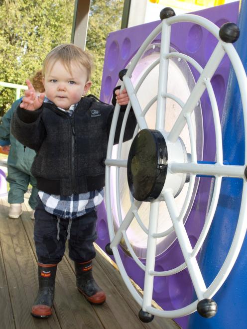 Charlie Turner (1½) skippers the 'Betsy Douglas', the steamboat that forms the new playground in...