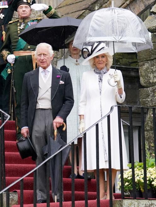King Charles III and Queen Camilla at a garden party in Edinburgh ahead of their coronation in...