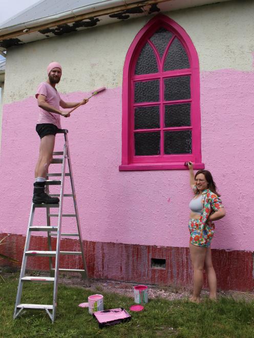 Sam Duckor-Jones and Freya Daly Sadgrove paint Gloria pink in 2021. PHOTO: ODT FILES