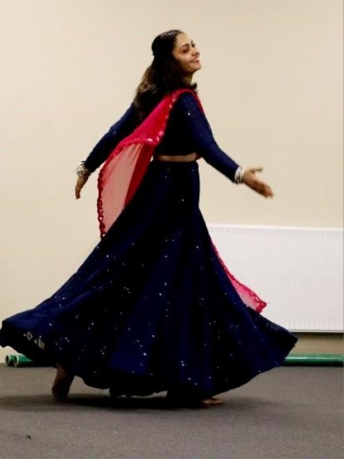 Cromwell resident Mamta Nerurkar performs Garba dance from her home in the Indian state of...