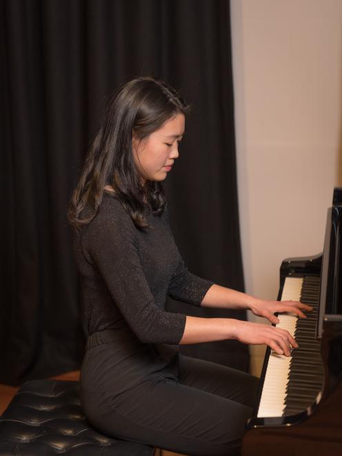 The Rhyth-Mix singers will be joined by concert pianist Megoe Chen at a spring concert next month...