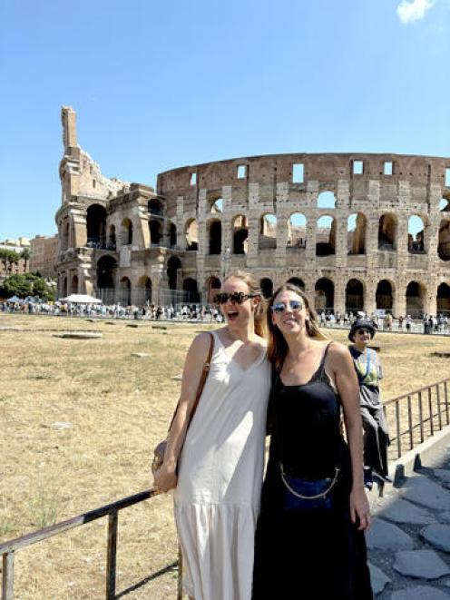 Ellesse Andrews (left) and a friend outside the Colosseum in Rome. Photo: Supplied