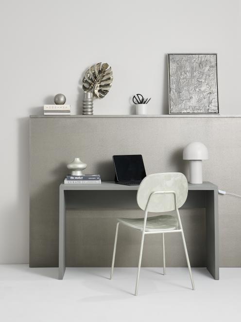 Metallics and luxe metallic finishes add creative flair to an otherwise neutral workspace. Wall...