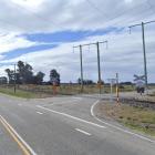 The railway crossing at the intersection of State Highway 1 and Kaik Rd. Photo: Google Mpas