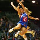 Liana Barrett-Chase, of the Steel, competes with Laura Langman, of the Magic, for the ball during...