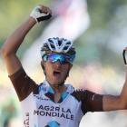 Alexis Vuillermoz crosses the finish line to win the 181.5km 8th stage of the Tour de France,...