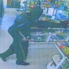 A CCTV image of a man suspected of carrying out an armed robbery at an Oamaru  dairy on Saturday....