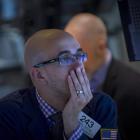 A trader works on the floor of the New York Stock Exchange earlier this month. Photo by Reuters..