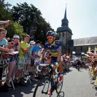 Alberto Contador of Spain arrives for the start of the 197km 10th stage of the Tour de France...