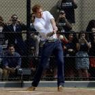 Britain's Prince Harry hits a baseball while participating in a baseball clinic in New York....