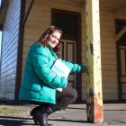 Central Otago District Council property and facilities officer Tara Bates  looks at  damage to...