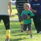 Charlie Jackson (4), of Dunedin, plays ti uru with adults at the Otago Museum Reserve during  the...