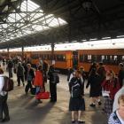 Commuters disembark from the train on Walk to Work day last month. ODT files