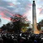 Dawn breaks over thousands of people at Queens Gardens in Dunedin. Photo by Craig Baxter.