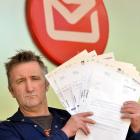 Dunedin businessman Lawrie Forbes is angry with the Otago Regional Council and New Zealand Post...