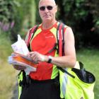 Dunedin posties organise the day's mail by street address before heading out on their deliveries....