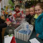 Helping out ... Tapanui Primary School parent teacher association member Rachael McKenzie gets...