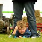 Hunter Evans (4) of Mataura waits to see the tractors.