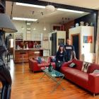 Lawrie and Sarndra Forbes in their warehouse apartment. ''Lucy the lamp'' (at left), was bought...