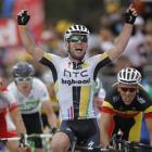Mark Cavendish of Britain celebrates winning the fifth stage of the Tour de France in Cap Frehel,...