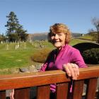 Mary Lawlor admires her work at the West Taieri cemetery.