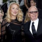 Model Jerry Hall and media magnate Rupert Murdoch announced their engagement  in an advertisement...