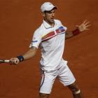 Novak Djokovic of Serbia returns against Richard Gasquet of France in their fourth round match at...