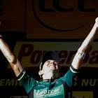 Pierre Rolland of France celebrates on the podium after winning the 11th stage of the 99th Tour...