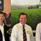 Silver Fern Farms chief executive Keith Cooper (centre) catches up with Marcus Glucina (left) and...