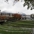 Snow on the hills is making for a cool day in Queenstown today. Photo James Beech