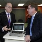 Southern DHB medical director of IT Dr Andrew Bowers (right) shows Health Minister Tony Ryall a...