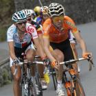 Stage winner Samuel Sanchez of Spain, right, and second place Jelle Vanendert of Belgium, left,...