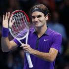 Switzerland's Roger Federer celebrates winning his men's singles semifinal against Britain's Andy...