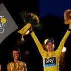 Team Sky rider Chris Froome of Britain celebrates his Tour de France victory on the podium after...