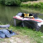 The damaged private jet boat, occupied by three men on a fishing trip, was photographed by...