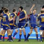 The Otago team celebrates after beating Auckland 32-25 last night.