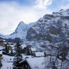 The sleepy village of Murren awakens under the immense peaks of Jungfrau, Monch and the Eiger....