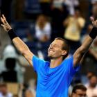 Tomas Berdych of the Czech Republic celebrates after defeating Roger Federer of Switzerland in...