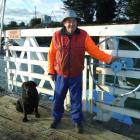 Tuapeka Punt operator Peter Dickson, with his dog Mission (7), has been ferrying people and cars...