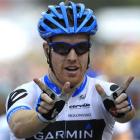Tyler Farrar of the US forms a 'W' in honour of his friend and training partner Wouter Weylandt,...